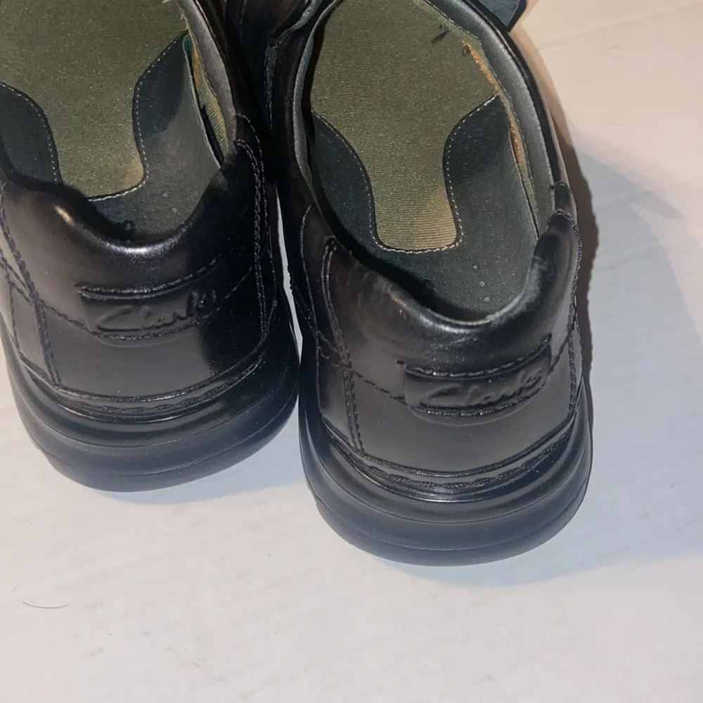 Clarks Escalate black slip on loafers size 10M with original box.